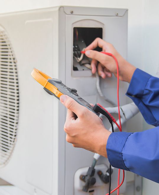 man testing an outdoor unit